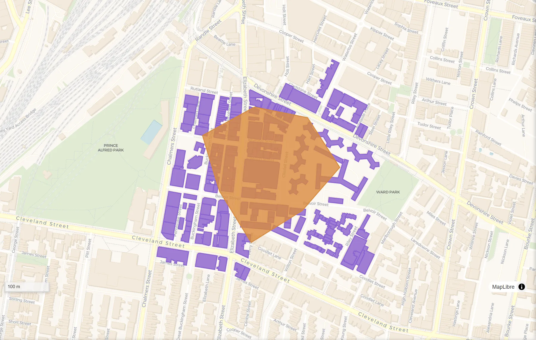 Clip, before: Buildings (purple) and a study area (orange).